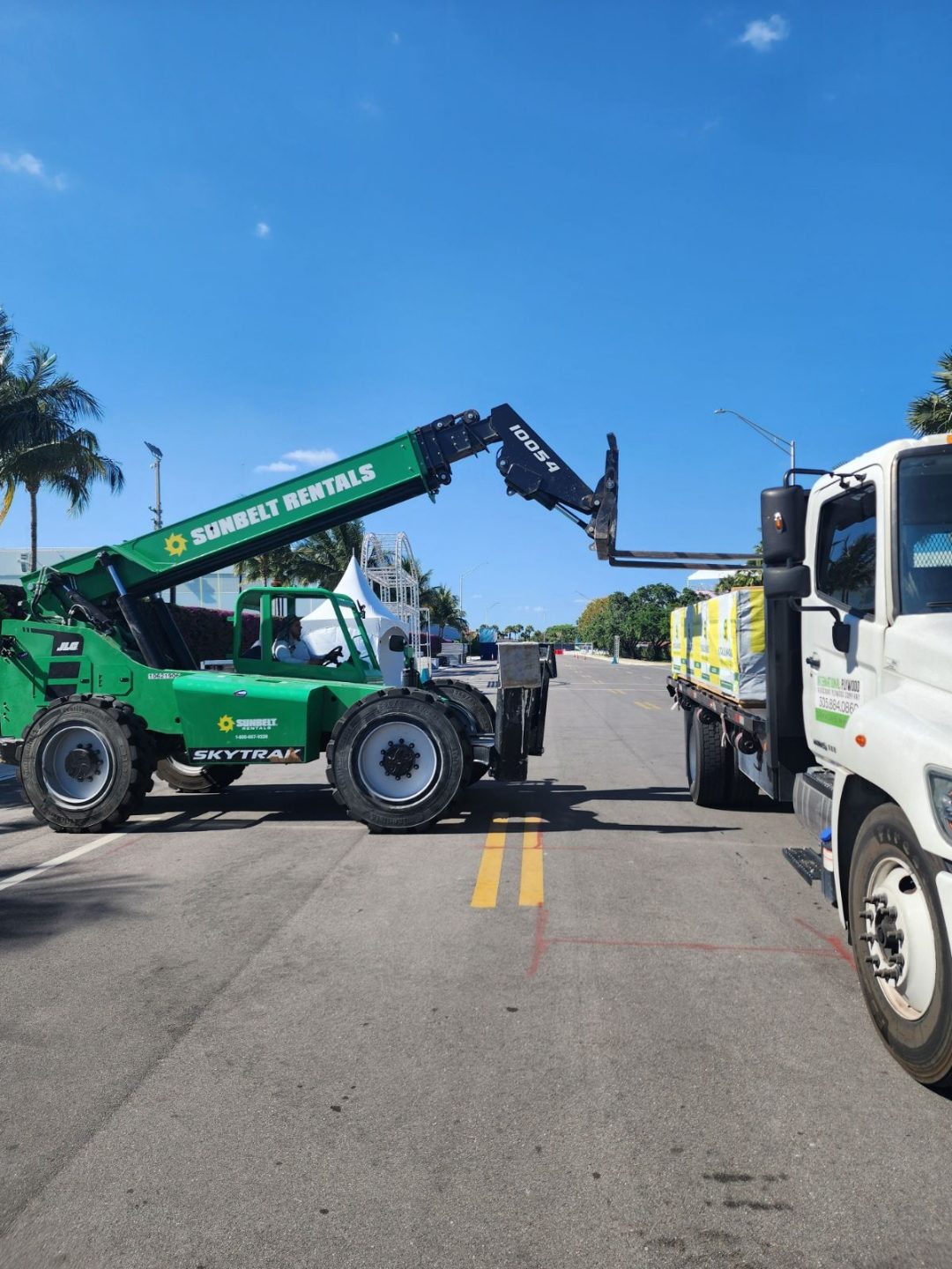 International Plywood truck delivering lumber at Miami waterfront event