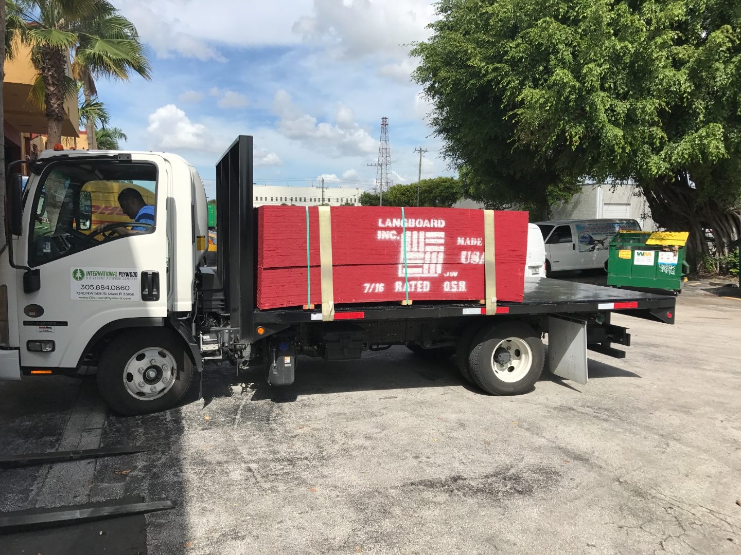 International Plywood delivery truck loaded at the Doral warehouse for a South Florida freight forwarder drop-off